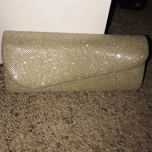 Gold clutch/off shoulder/or hang purse